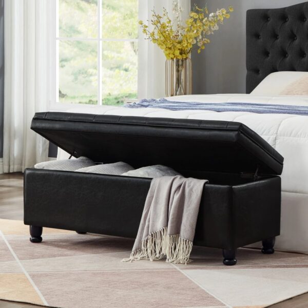 black-faux-leather-tufted-storage-bench-leg-detail