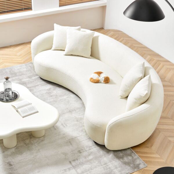 elara-teddy-curved-sofa-room-angle