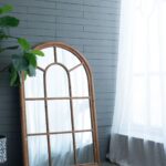 large-arched-window-brown-wood-wall-mirror-decor-living