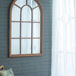 large-arched-window-brown-wood-wall-mirror-room-accent