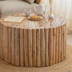 loon-peak-natural-wood-round-coffee-table-room-angle