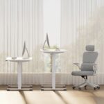 white-electric-standing-desk-in-office-sitting