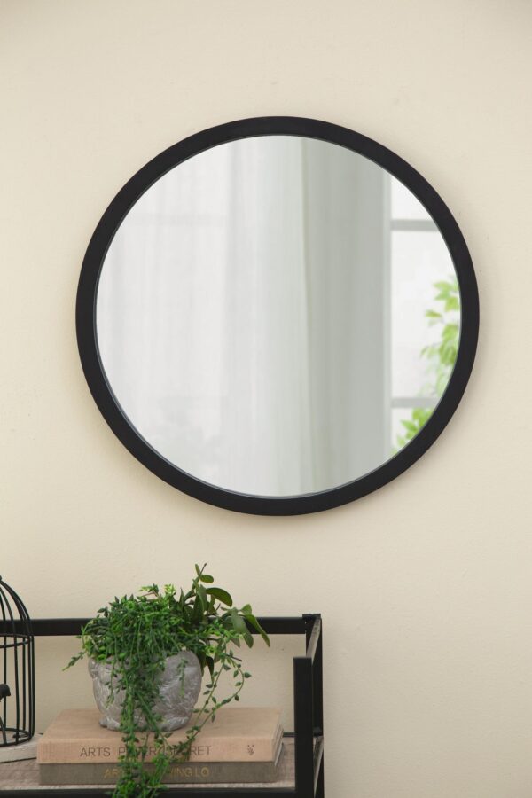 20-inch-round-black-wooden-frame-wall-mirror-room-view.jpg